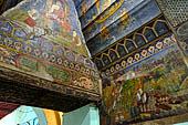 Paintings on the wall of the outer cloister of the Mahamuni Paya, Mandalay, Myanmar 